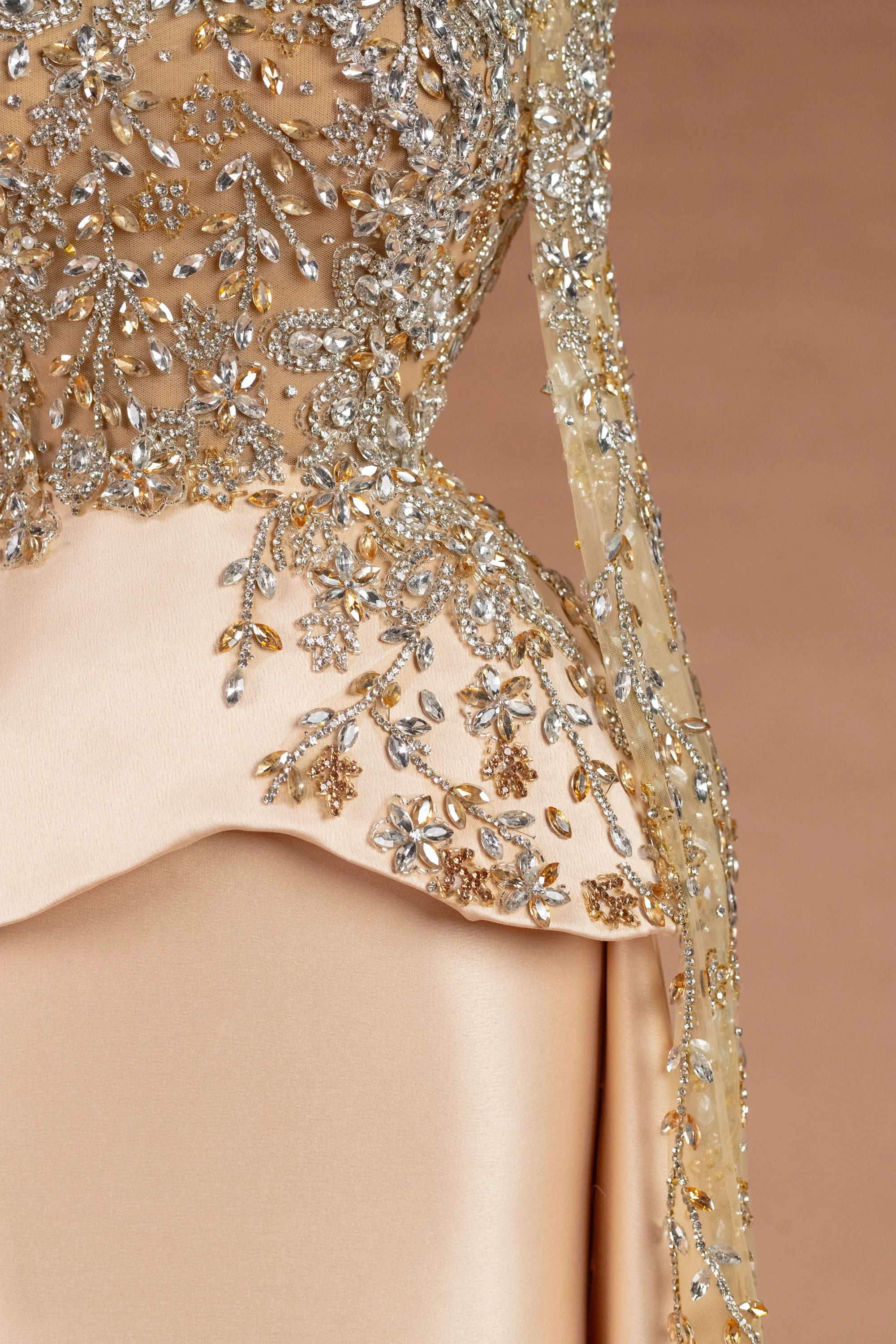 Sihëna شمسُ الشتاء — champagne illusion long-sleeve column evening dress