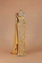 Sihëna Aurum Bower — gold strapless sleeveless column gown with 3D floral embroidery.