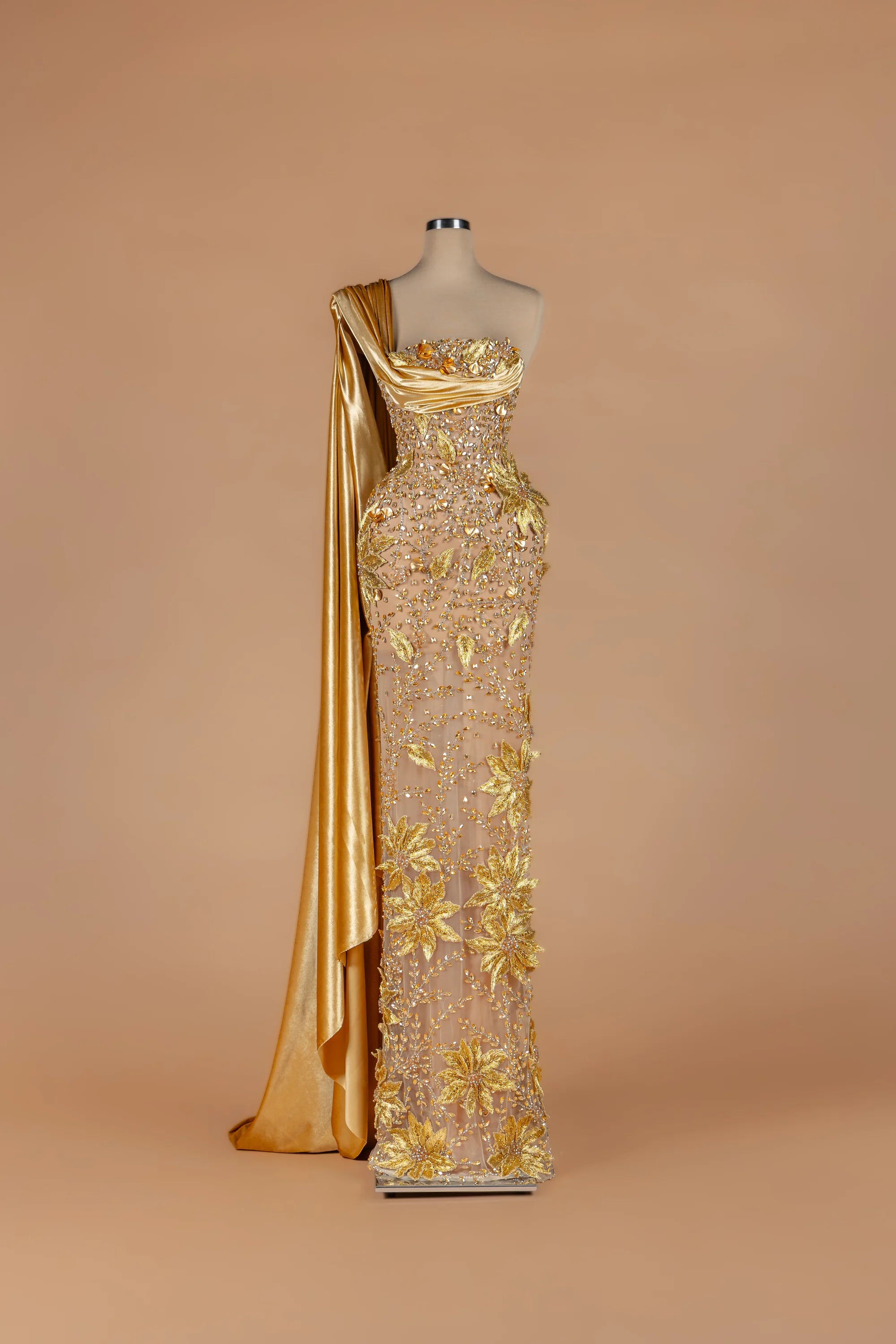 Sihëna Aurum Bower — gold strapless sleeveless column gown with 3D floral embroidery.