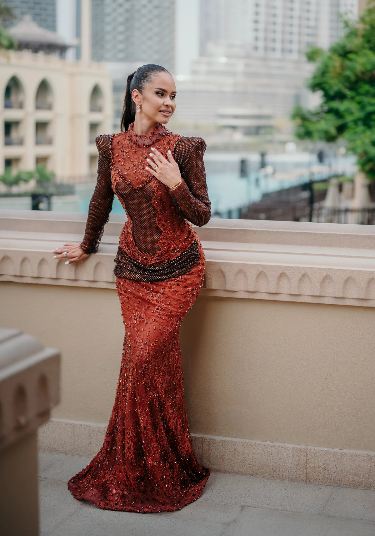 Sihëna Carnelian Sarabande — rust high-neck long-sleeve mermaid evening dress
