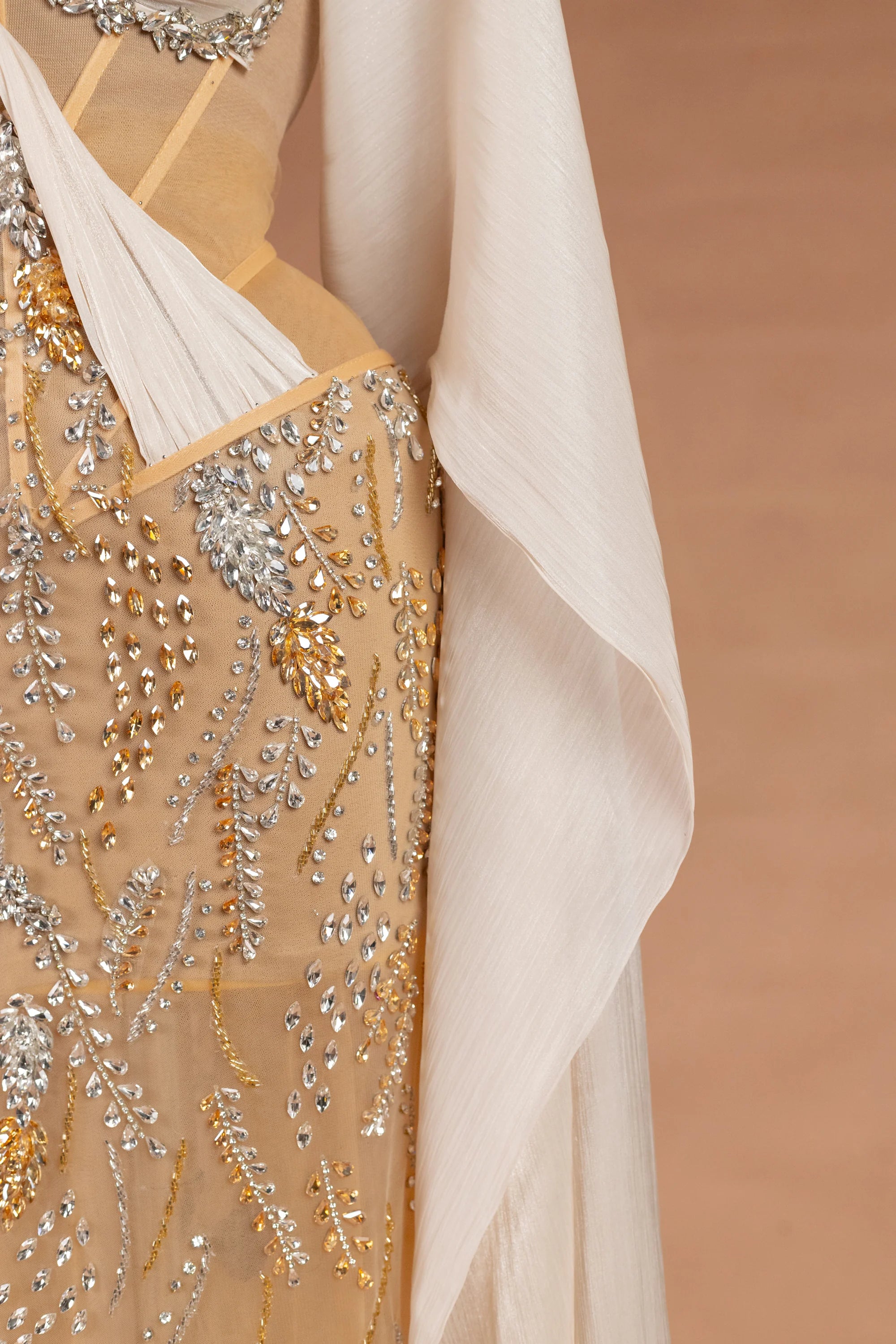 Sihëna غَلالَةُ القَمَر — champagne halter cape-sleeve column evening dress