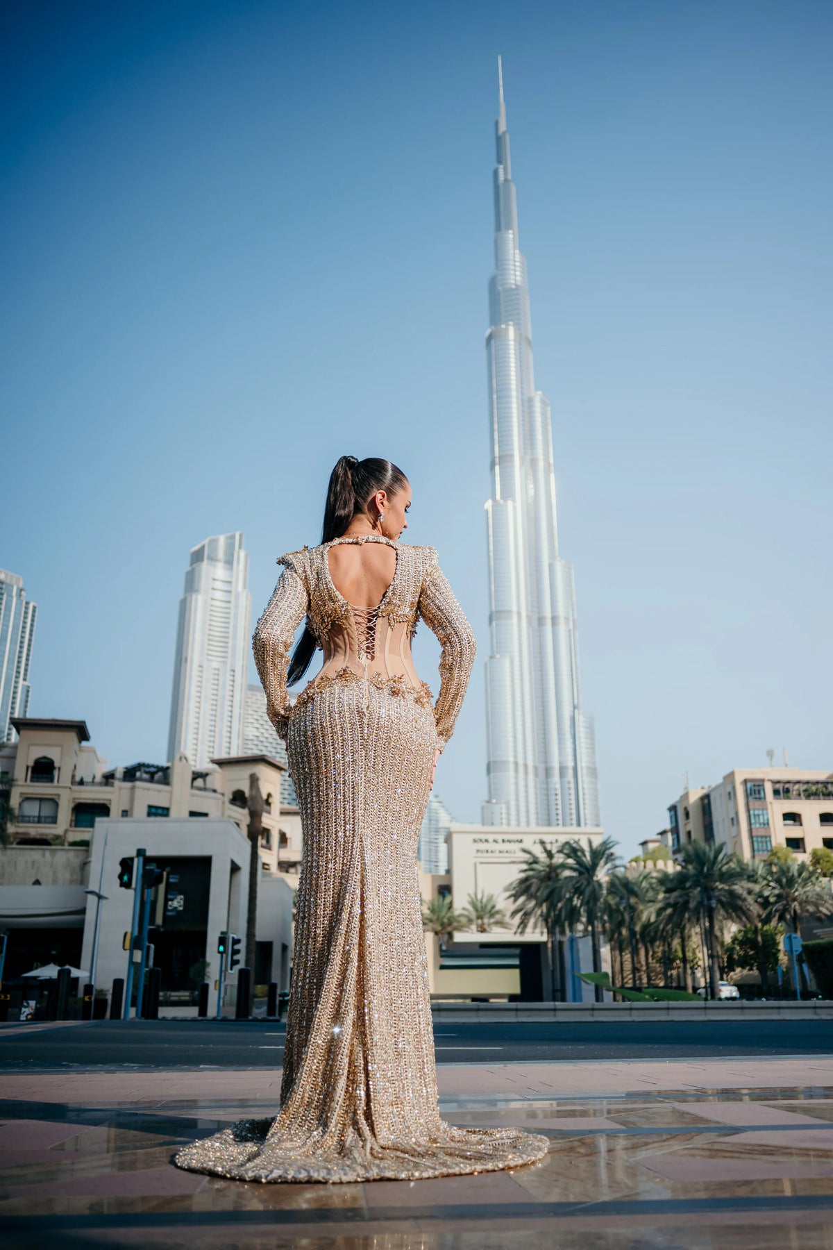 Sihëna Heliodor Colonnade — gold high-neck long-sleeve column evening dress