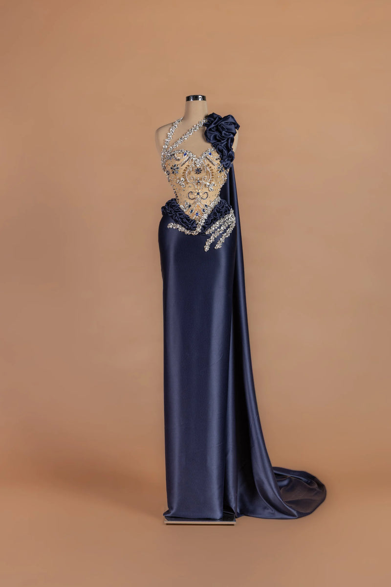 Sihëna Ink Rose — navy asymmetric sleeveless column gown with 3D floral detailing.
