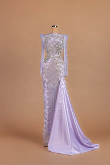 Sihëna Iris Starfall — lilac illusion long-sleeve column gown with 3D floral embellishment.