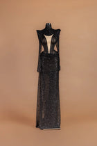 Sihëna Jet Vesper — black high-neck long-sleeve column gown with a sheer boned corset bodice.