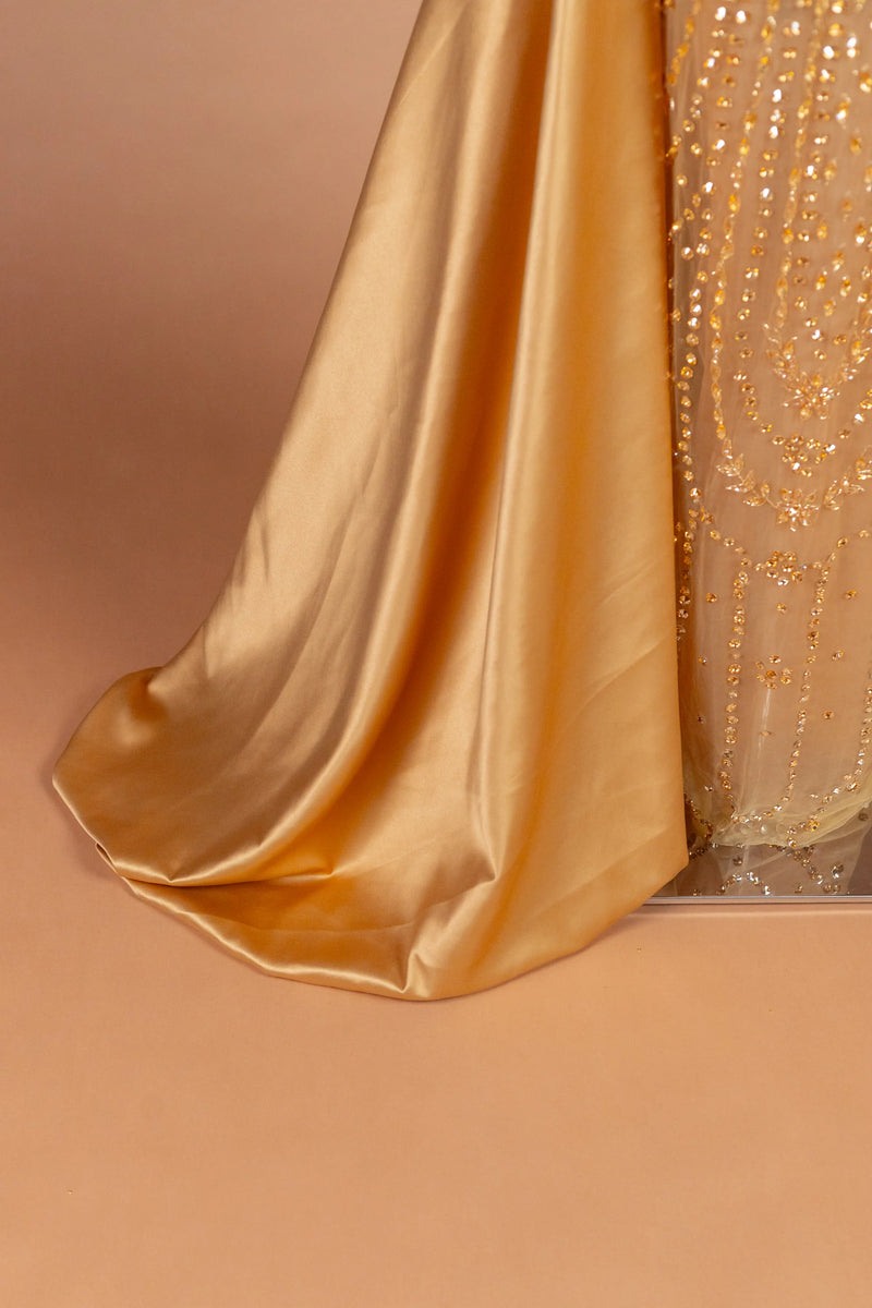 Sihëna صَوْلَجانُ الذَّهَب — gold high-neck long-sleeve column evening dress