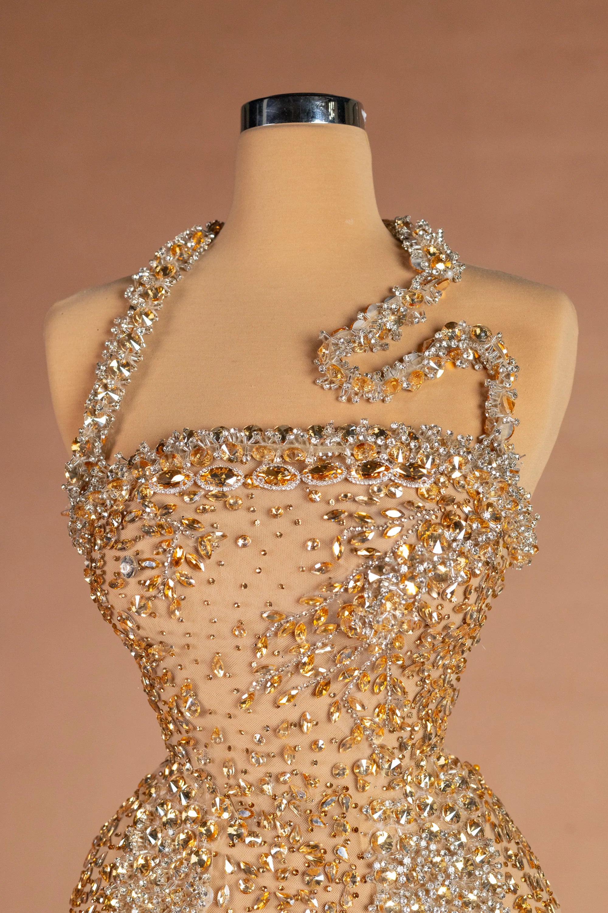 Sihëna رمالُ الذهب — gold halter sleeveless fitted evening dress