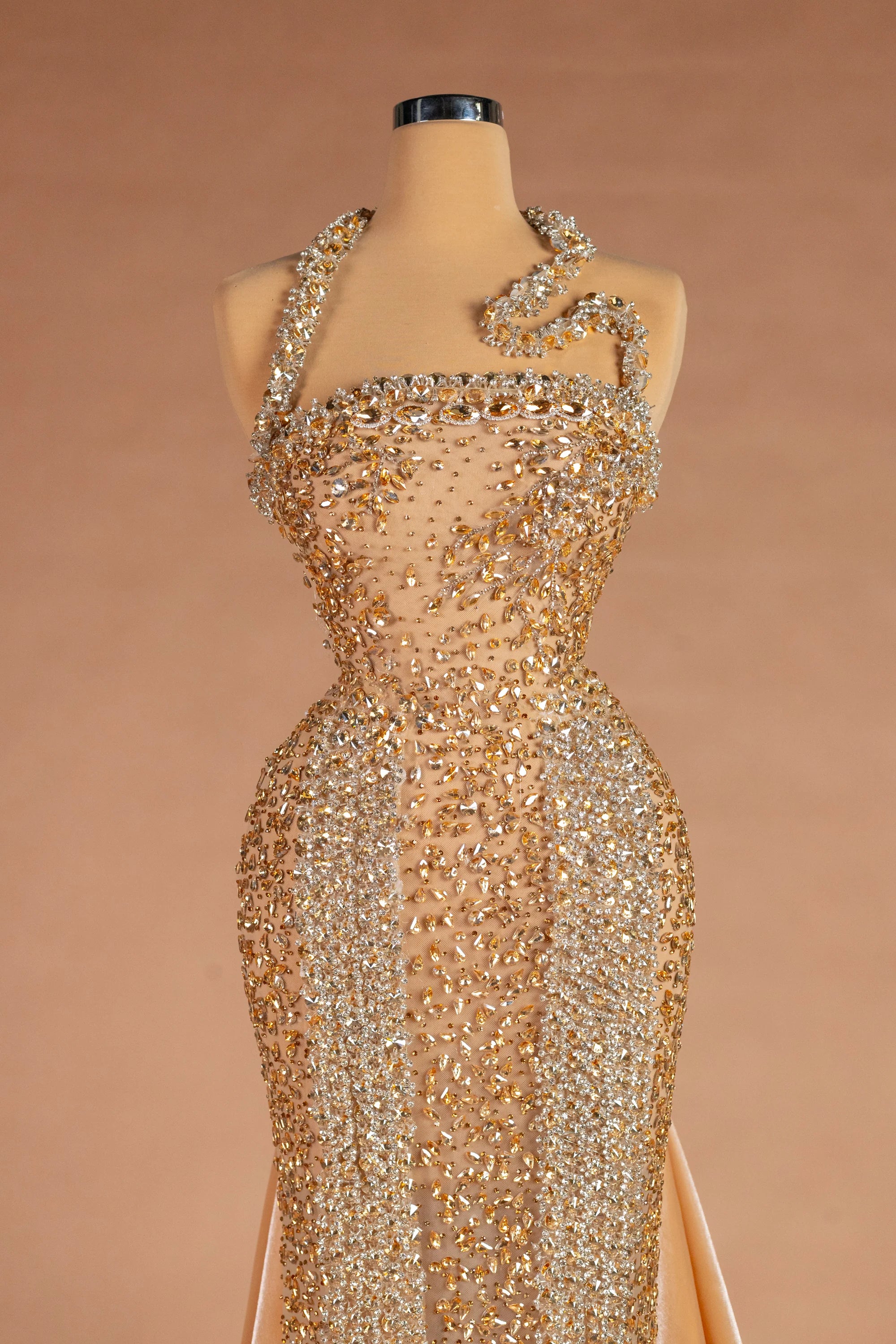 Sihëna رمالُ الذهب — gold halter sleeveless fitted evening dress