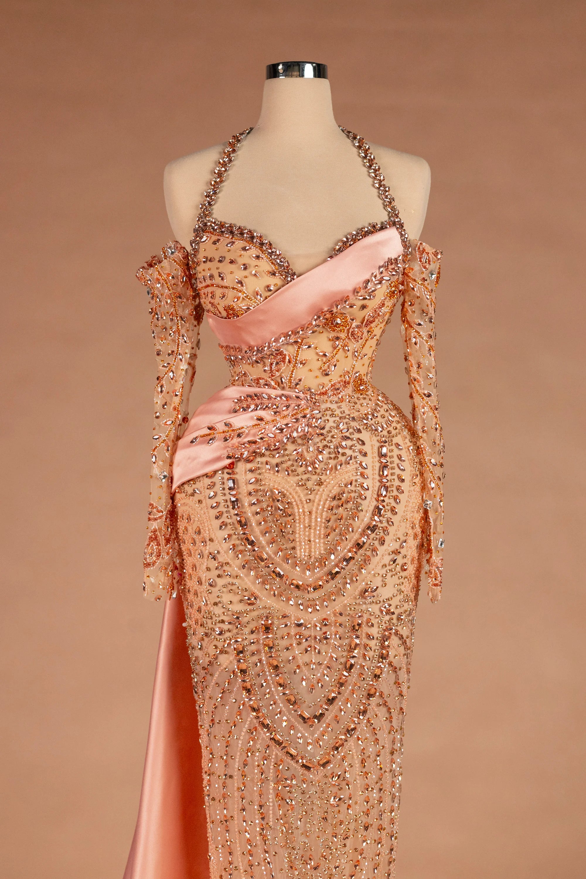 Sihëna شَدْوُ الفَجْر — blush halter off-shoulder column evening dress