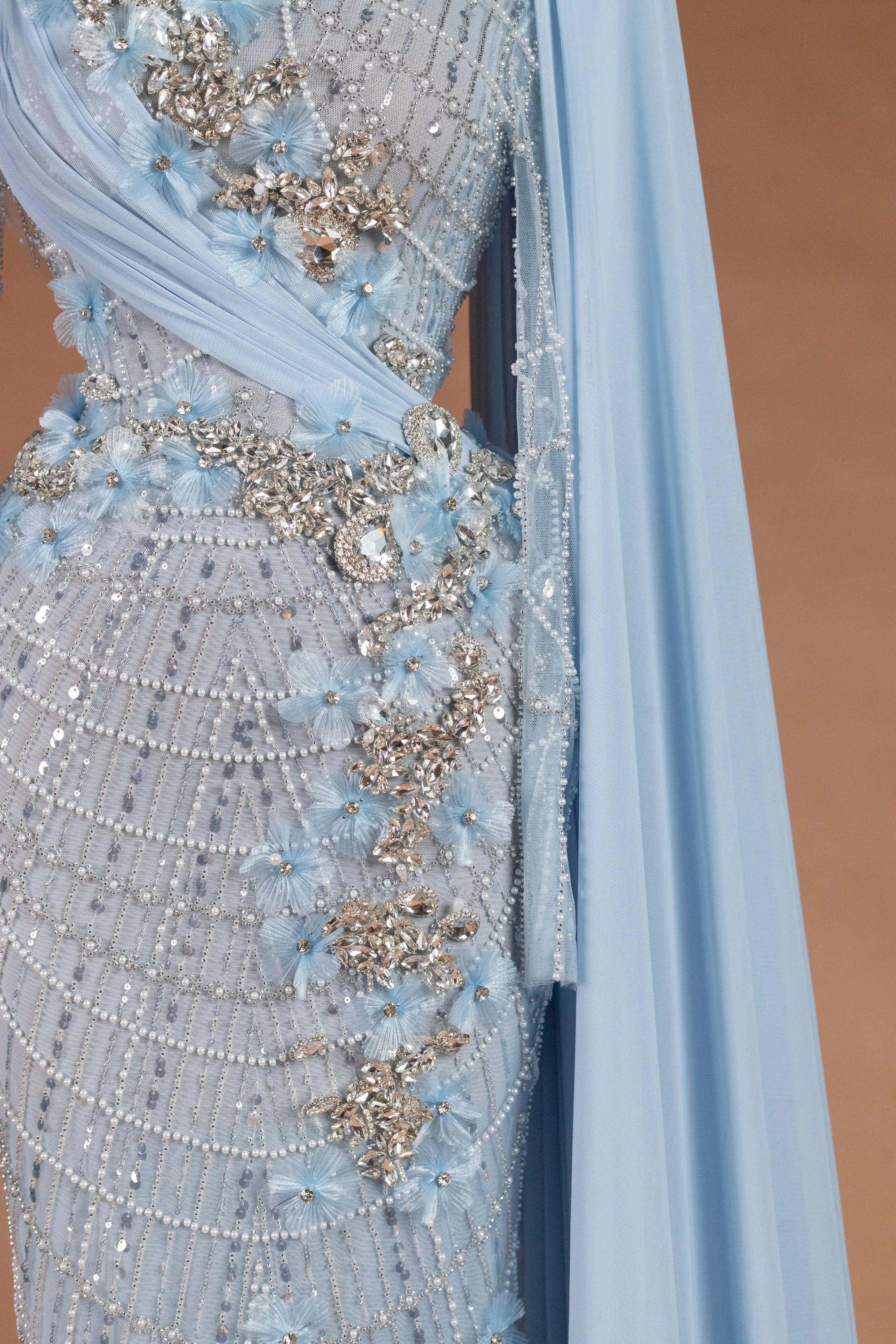 Sihëna لآلئُ الشتاء — powder-blue high-neck long-sleeve column evening dress