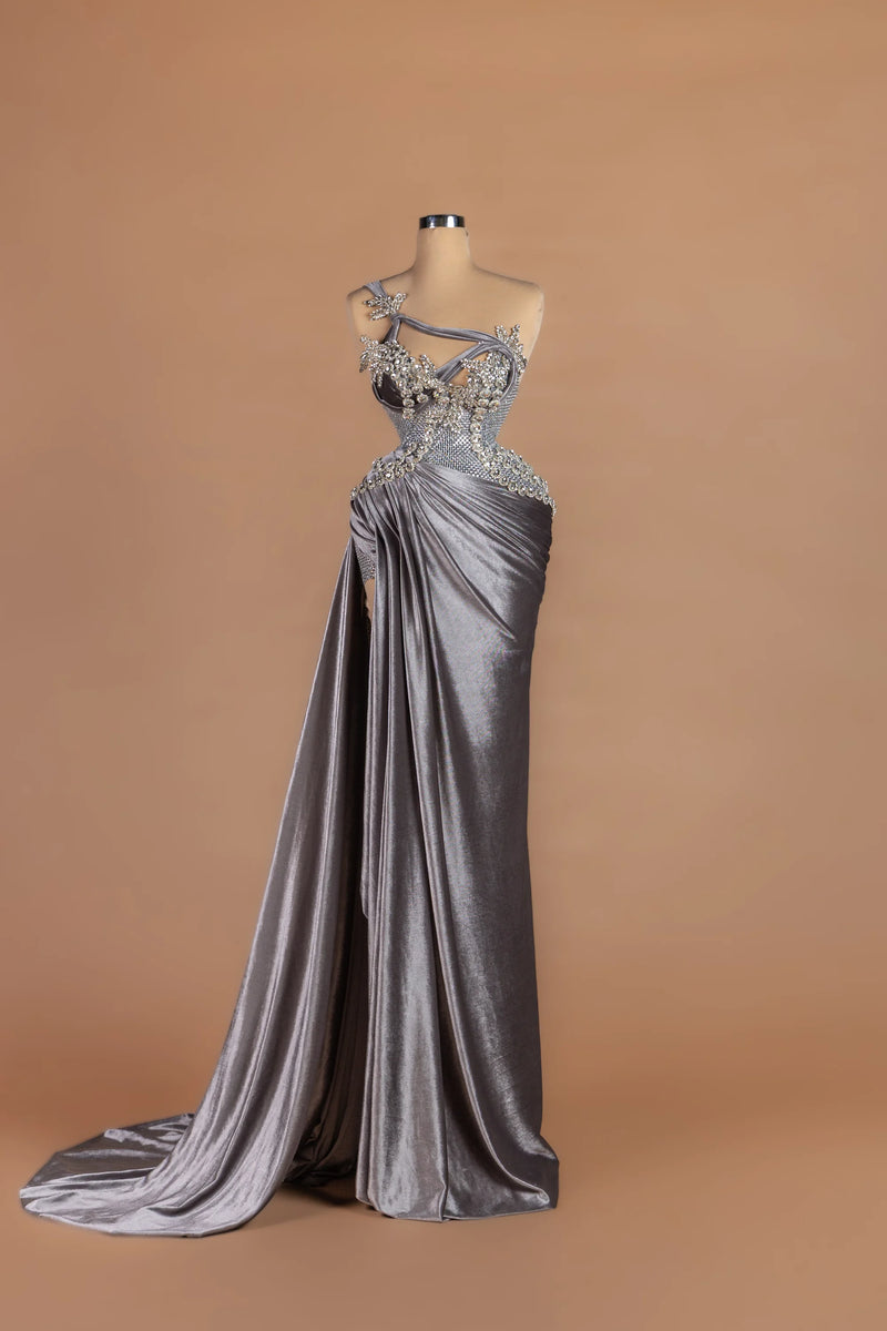 Sihëna Quicksilver Drift — silver one-shoulder sleeveless fitted gown with a draped velvet side train.
