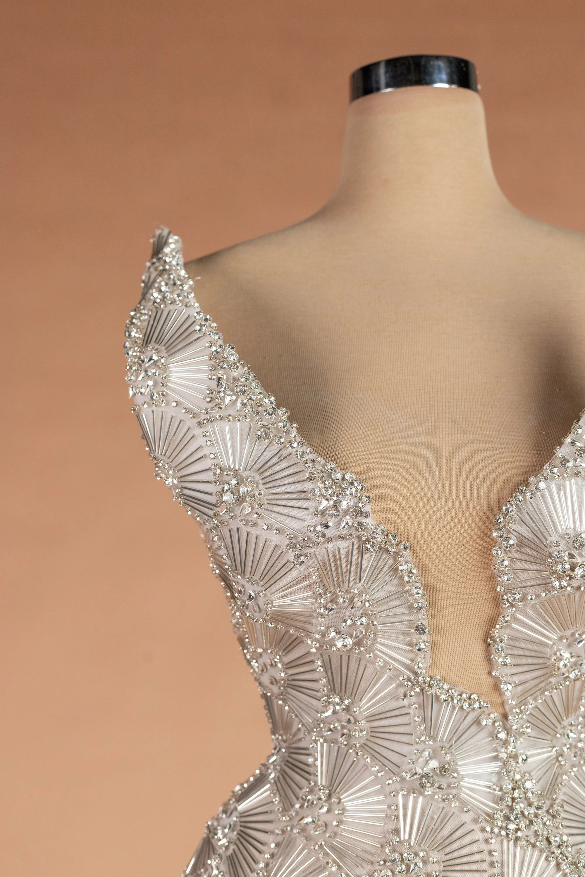 Sihëna وابِلُ الفضّة — silver v-neck sleeveless column evening dress