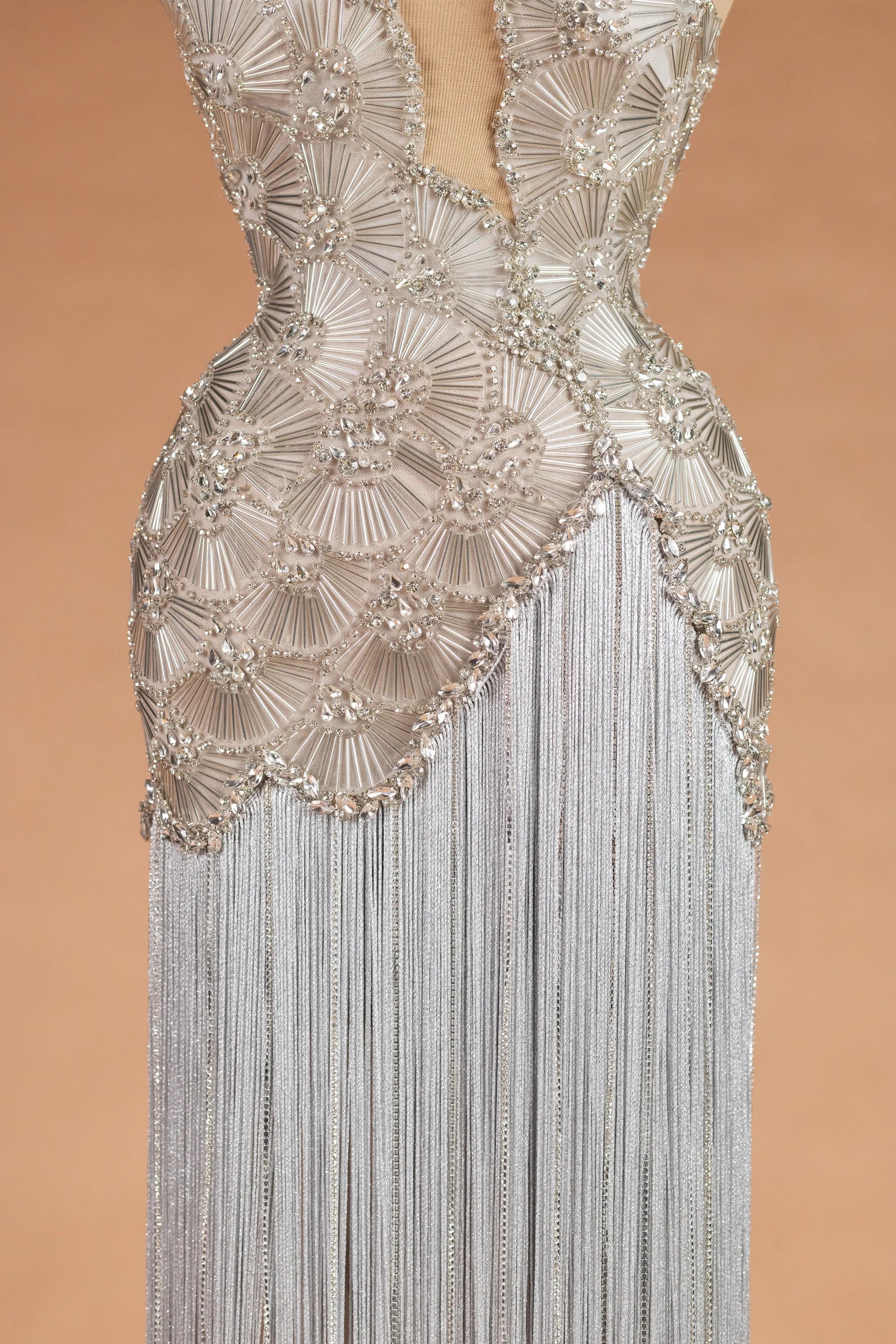 Sihëna وابِلُ الفضّة — silver v-neck sleeveless column evening dress