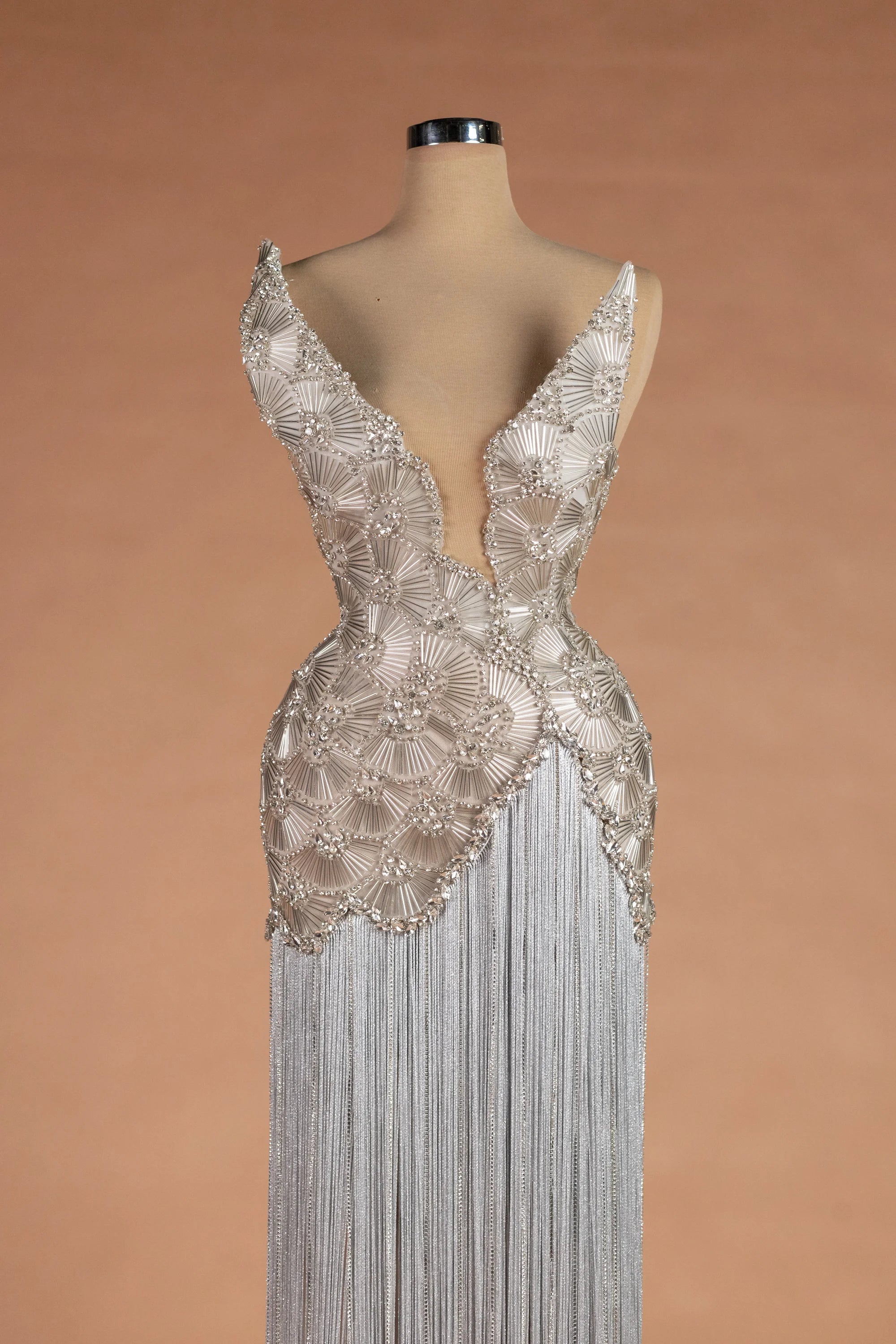 Sihëna وابِلُ الفضّة — silver v-neck sleeveless column evening dress