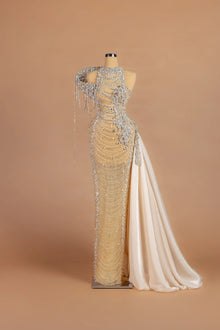 Sihëna Topaz Festoon — champagne high-neck sleeveless column gown with draped crystal-bead festoons.
