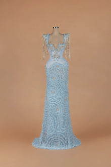 Sihëna Winter Waltz — powder-blue v-neck sleeveless mermaid gown with crystal-beaded 3D floral ruffles.